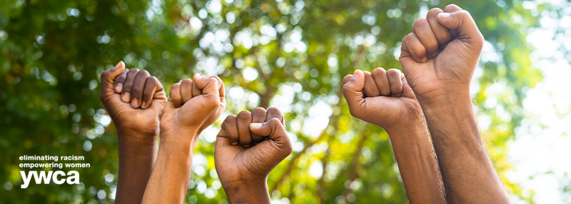 Fists raised in the air